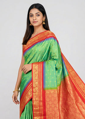 Green Handloom Kanjivaram Pure Silk Saree With Blouse Piece