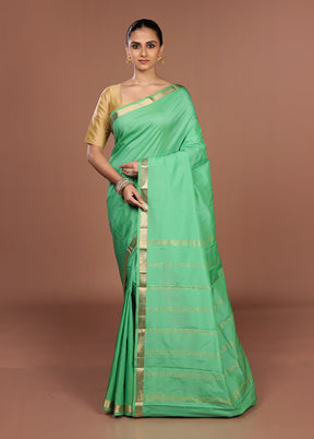 Green Kanjivaram Silk Saree With Blouse Piece