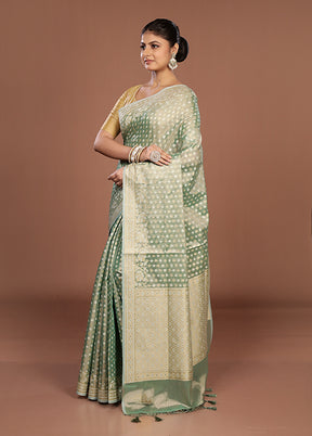 Green Tissue Silk Saree With Blouse Piece