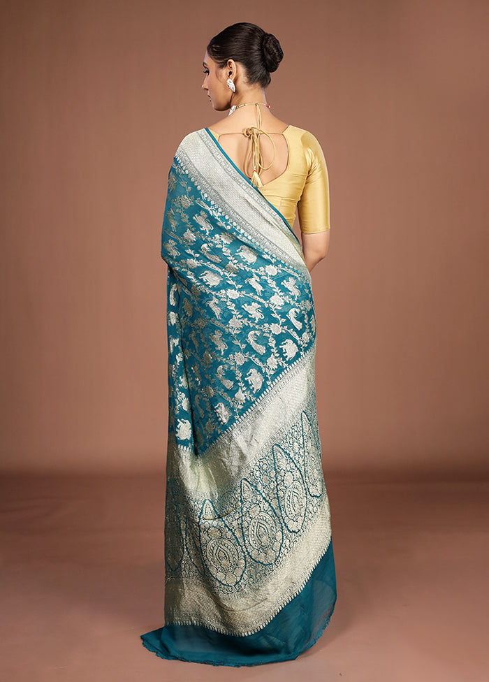 Green Handloom Pure Georgette Saree With Blouse Piece