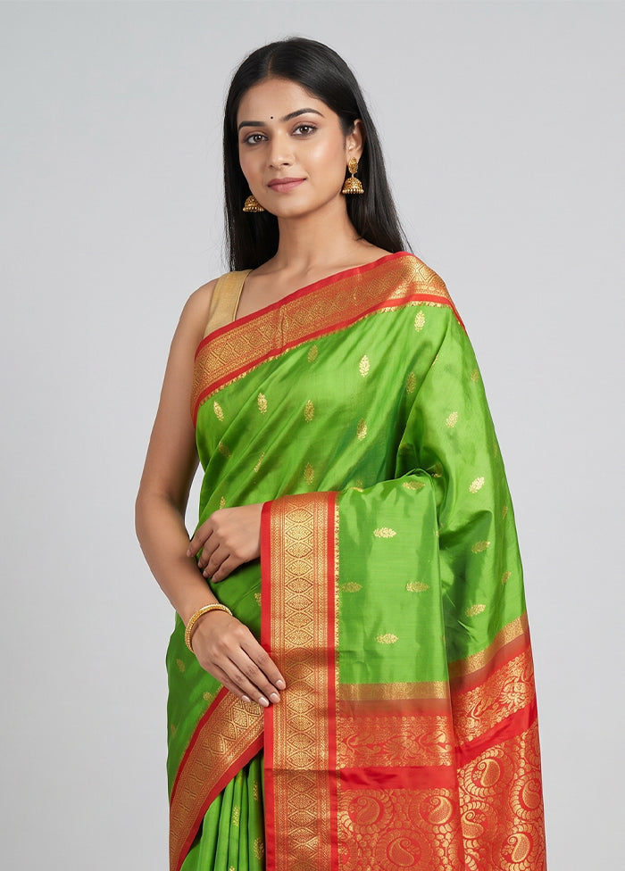Green Handloom Kanjivaram Silk Saree With Blouse Piece