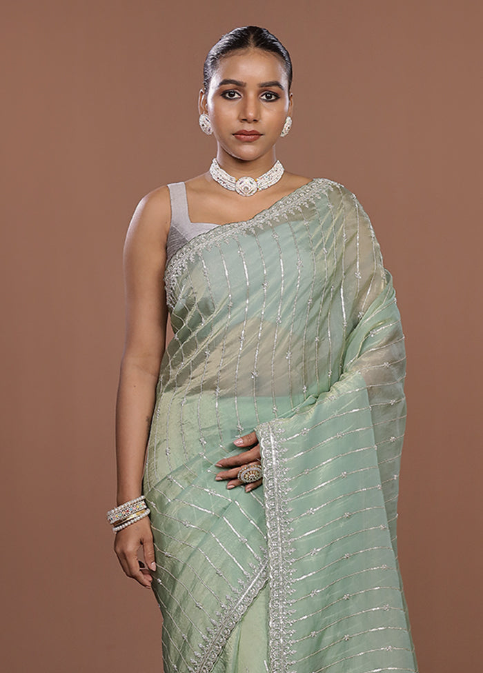 Green Tissue Silk Saree With Blouse Piece