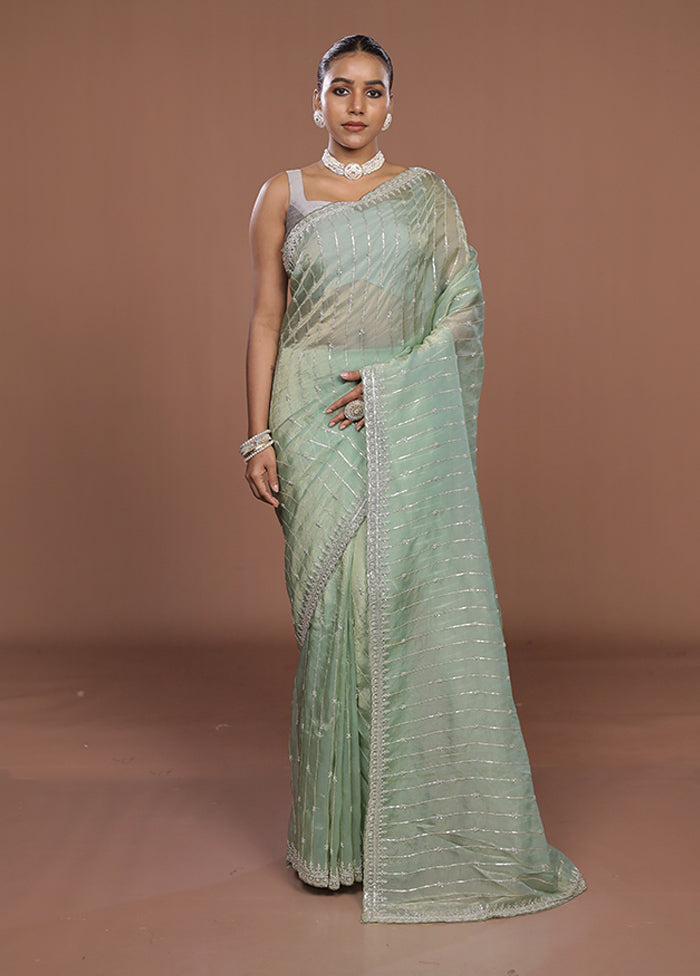 Green Tissue Silk Saree With Blouse Piece