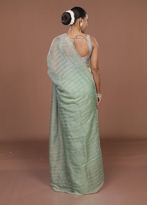 Green Tissue Silk Saree With Blouse Piece