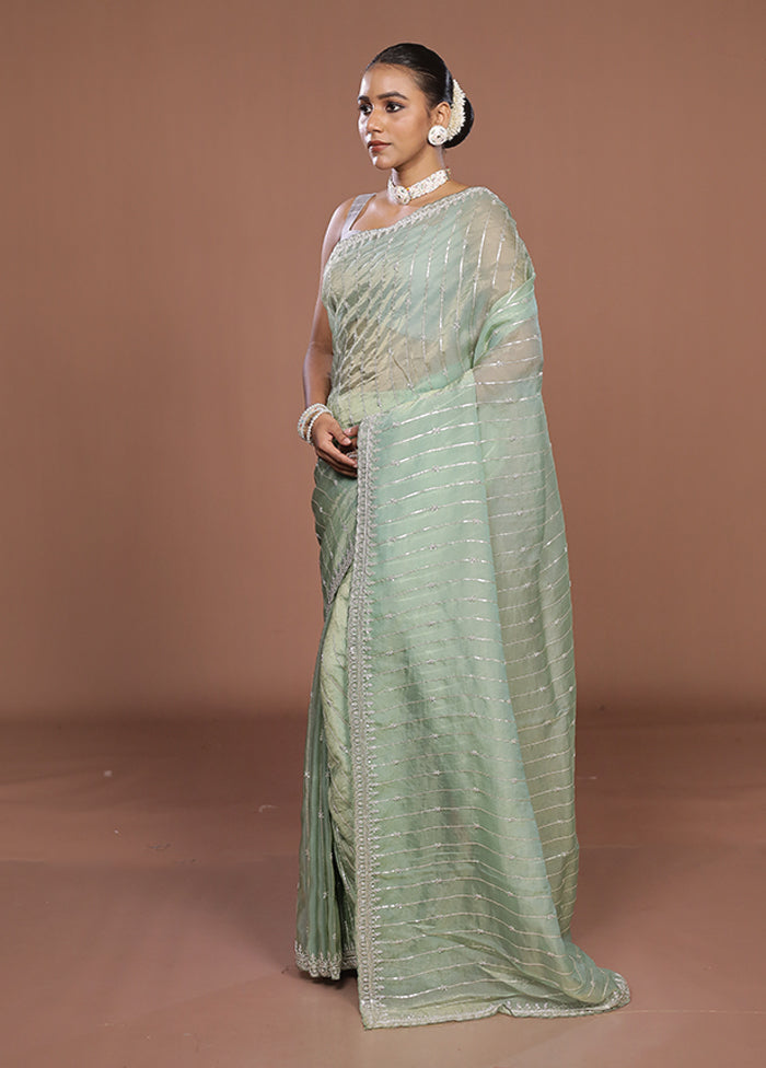 Green Tissue Silk Saree With Blouse Piece