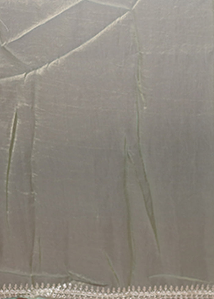 Green Tissue Silk Saree With Blouse Piece