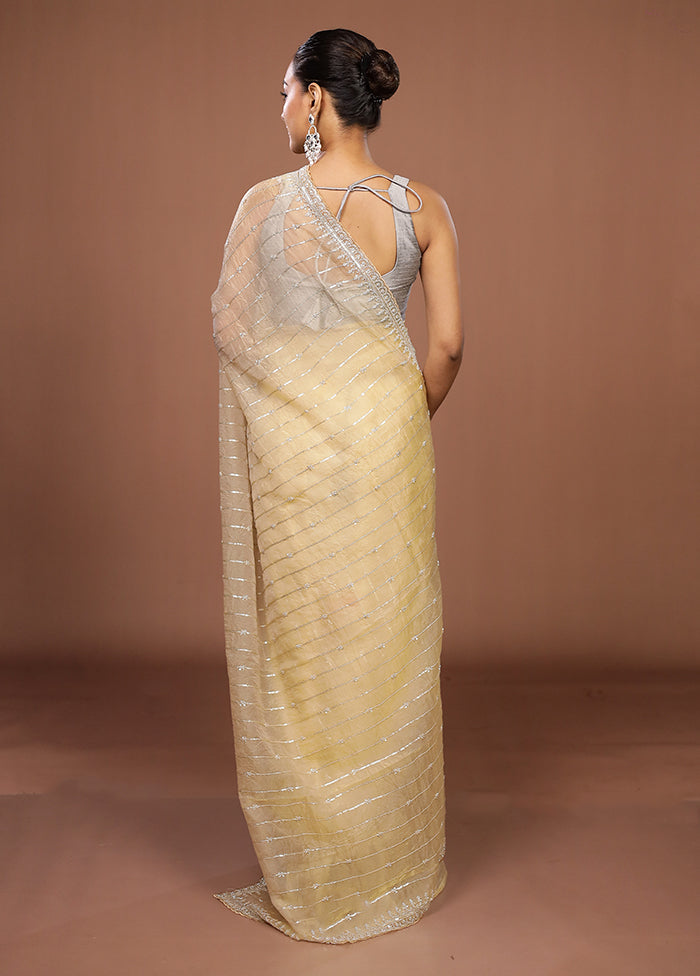 Cream Tissue Silk Saree With Blouse Piece