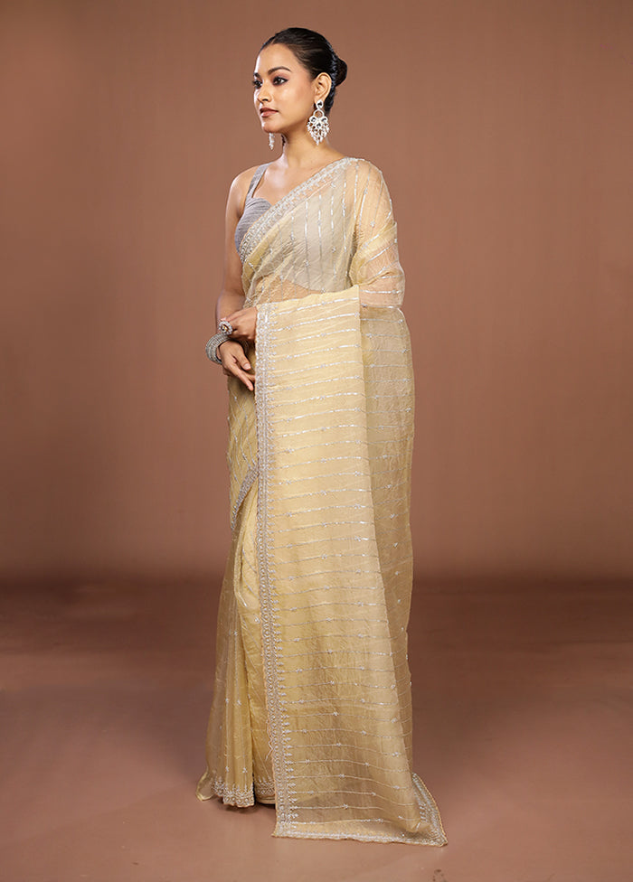 Cream Tissue Silk Saree With Blouse Piece