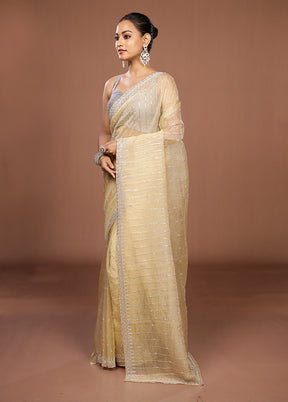 Cream Tissue Silk Saree With Blouse Piece