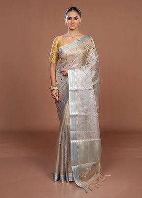 Cream Tissue Silk Saree With Blouse Piece