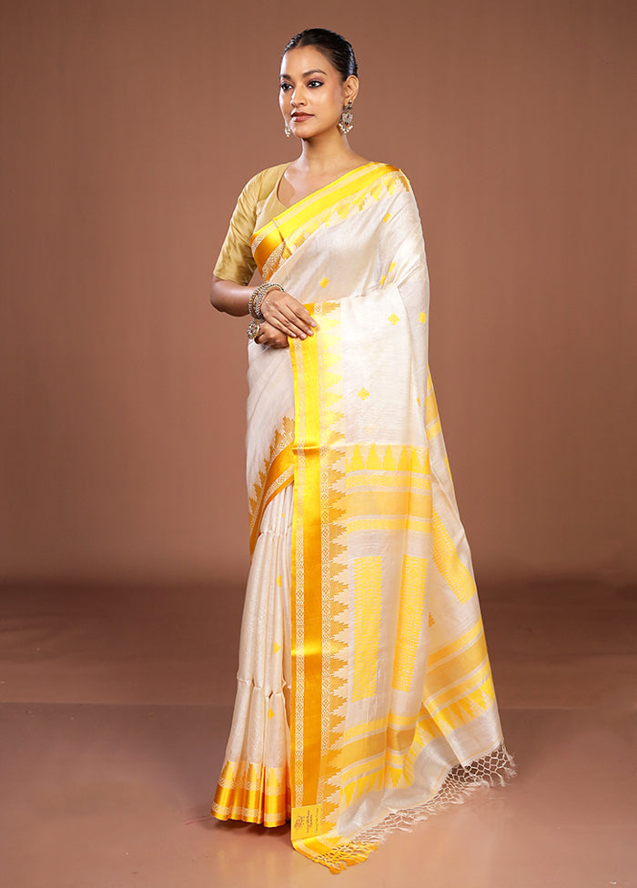Cream Handloom Tussar Pure Silk Saree With Blouse Piece