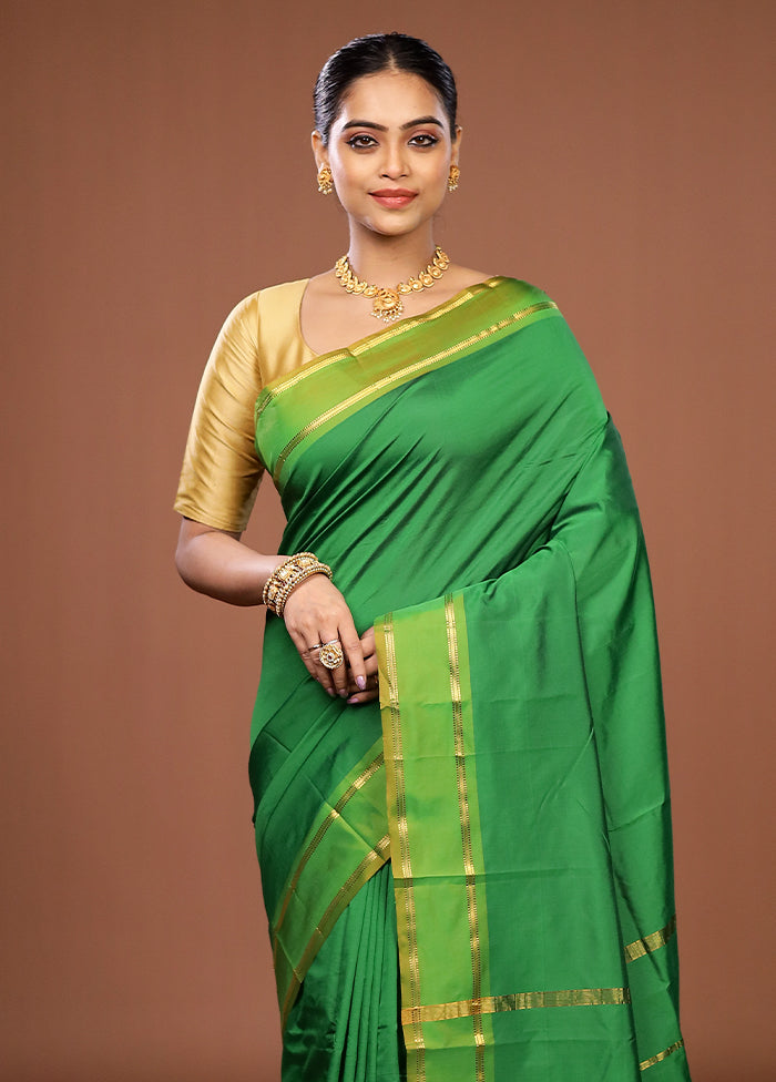 Green Kanjivaram Silk Saree With Blouse Piece