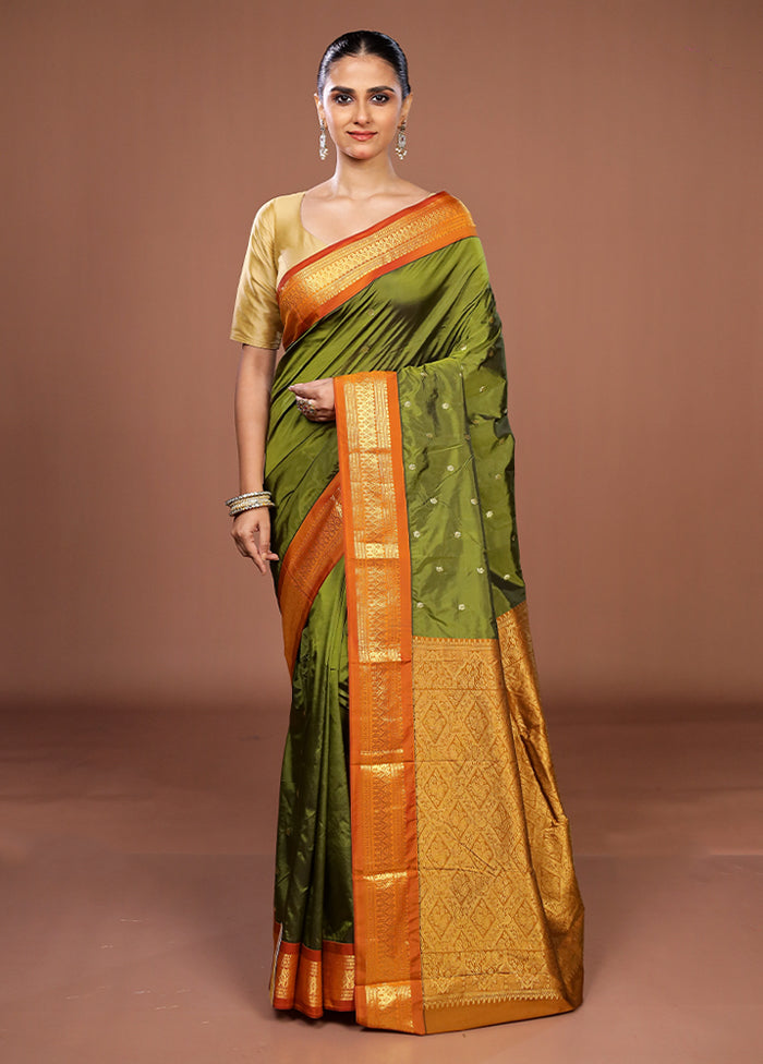 Green Kanjivaram Silk Saree With Blouse Piece