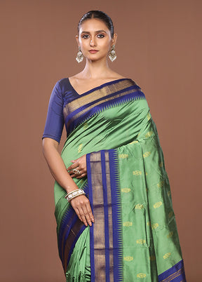 Green Kanjivaram Silk Saree With Blouse Piece