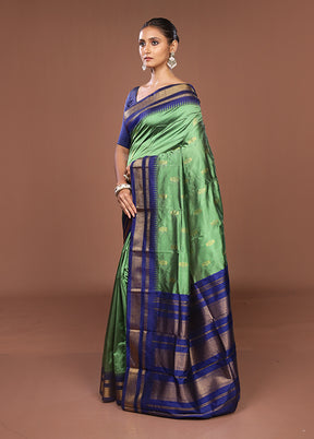 Green Kanjivaram Silk Saree With Blouse Piece