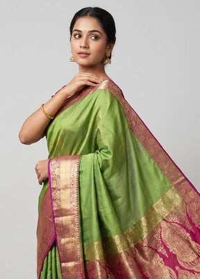 Green Banarasi Silk Saree With Blouse Piece