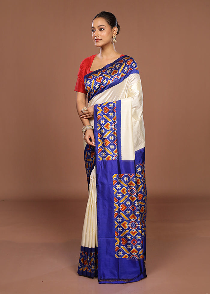 White Handloom Ikkat Pure Silk Saree With Blouse Piece