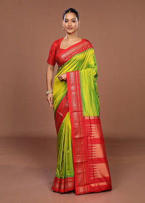 Green Handloom Kanjivaram Pure Silk Saree With Blouse Piece