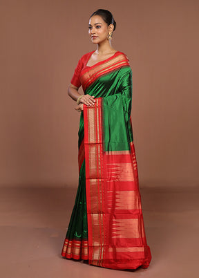 Green Handloom Kanjivaram Pure Silk Saree With Blouse Piece