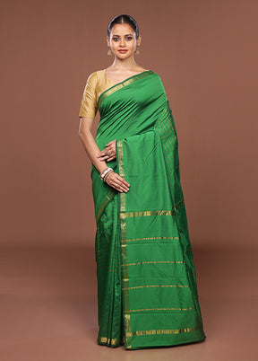 Green Kanjivaram Silk Saree With Blouse Piece