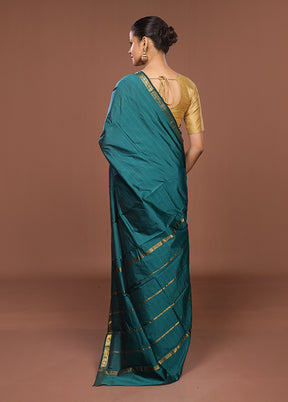 Green Kanjivaram Silk Saree With Blouse Piece