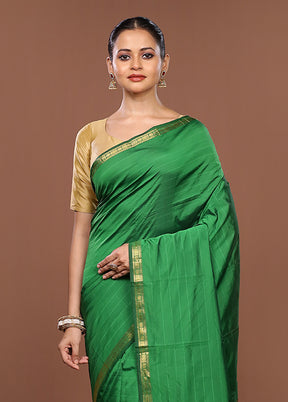 Green Kanjivaram Silk Saree With Blouse Piece
