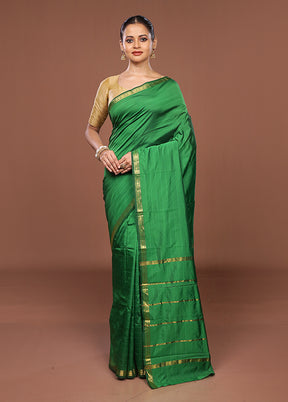 Green Kanjivaram Silk Saree With Blouse Piece