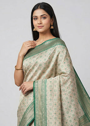 Cream Tissue Silk Saree With Blouse Piece