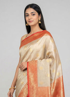 Cream Tissue Silk Saree With Blouse Piece