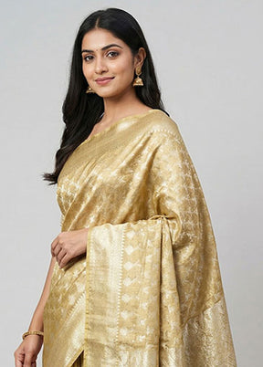 Cream Tissue Silk Saree With Blouse Piece
