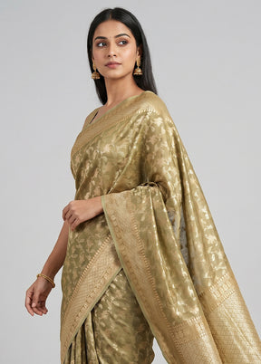 Green Tissue Silk Saree With Blouse Piece