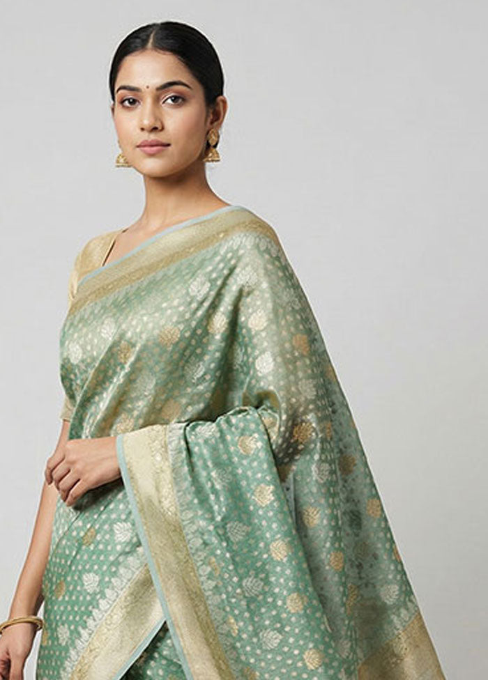 Green Tissue Silk Saree With Blouse Piece