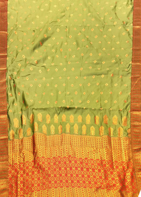 Green Assam Silk Saree With Blouse Piece