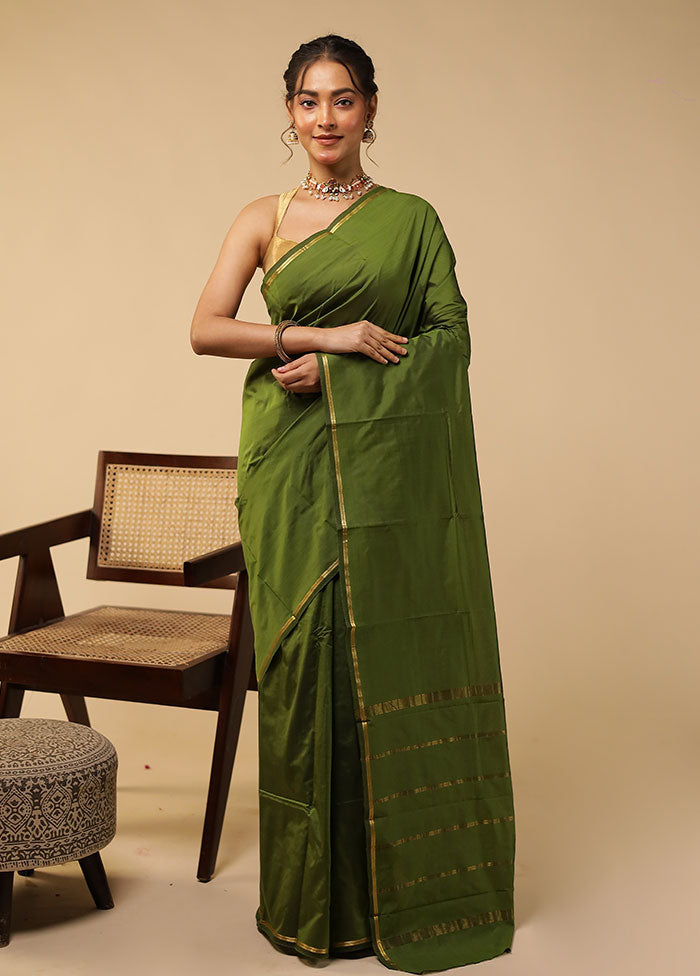 Green Kanjivaram Silk Saree With Blouse Piece