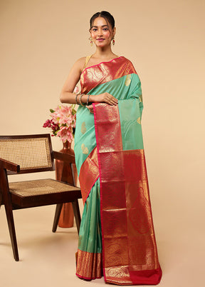 Green Kanjivaram Silk Saree With Blouse Piece