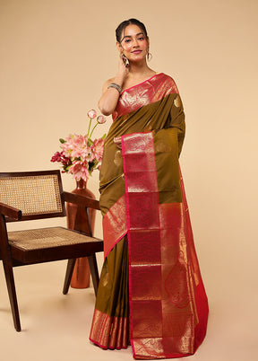 Green Kanjivaram Silk Saree With Blouse Piece