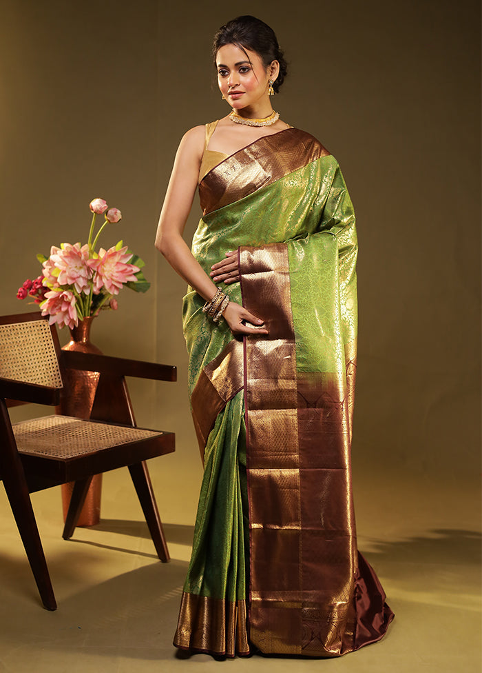 Green Kanjivaram Silk Saree With Blouse Piece