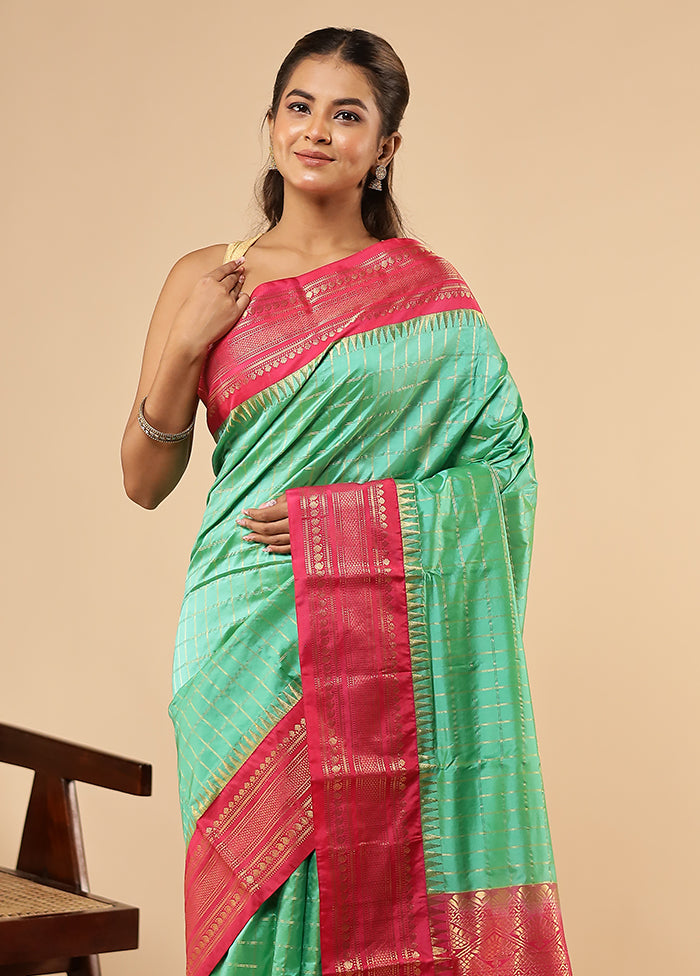 Green Handloom Kanjivaram Pure Silk Saree With Blouse Piece