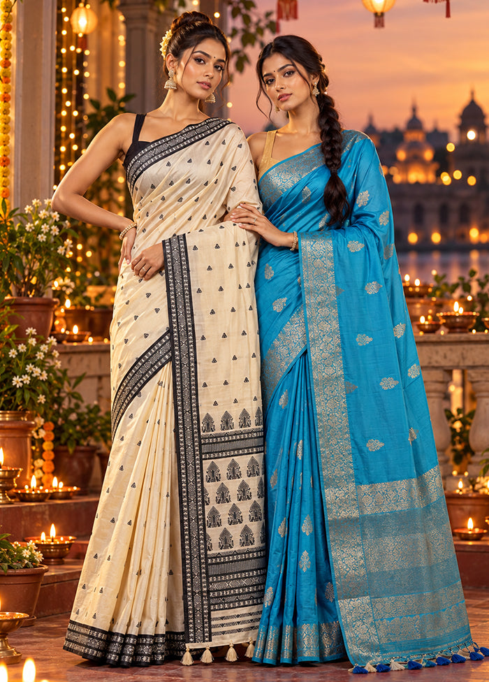 Chandan Haze Duo – Cream Assam Silk & Blue Dupion Silk Sarees