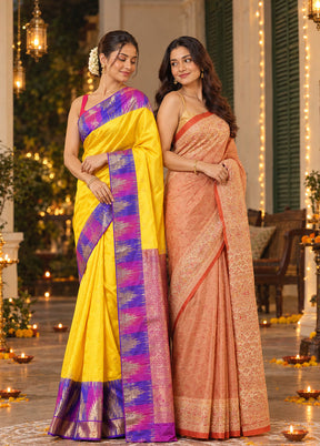 Kojagori Duo – Yellow Kanchipuram & Peach Printed Silk Sarees