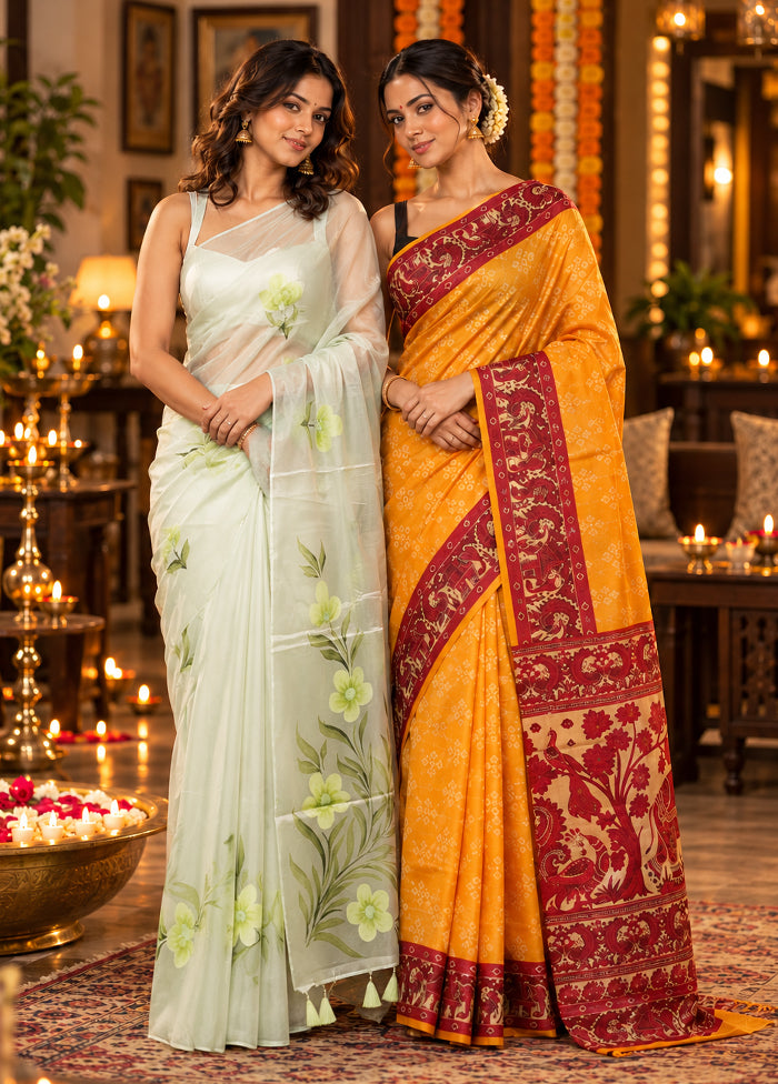 Rose Copper Duo – Green Organza & Yellow Printed Silk Sarees