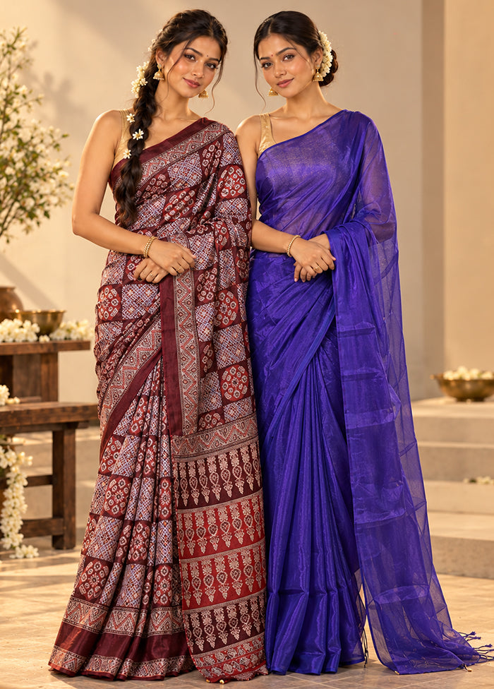 Shahi Durbar Duo – Maroon Printed Silk & Blue Tissue Silk Sarees