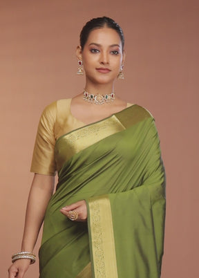 Green Kanjivaram Silk Saree With Blouse Piece