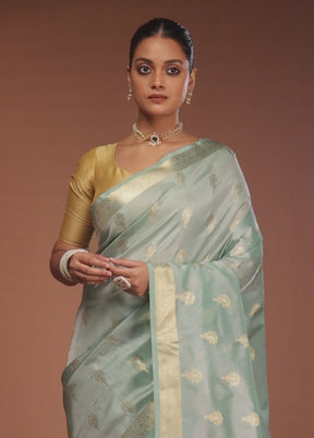 Green Tissue Silk Saree With Blouse Piece