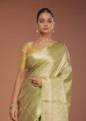 Green Tissue Silk Saree With Blouse Piece