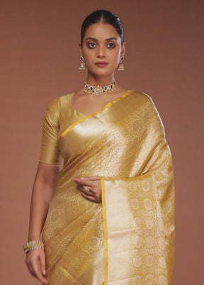Yellow Tissue Silk Saree With Blouse Piece