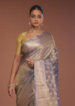 Green Tissue Silk Saree With Blouse Piece